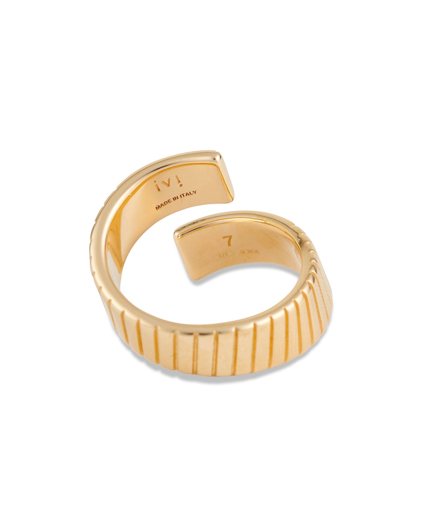 A gold-plated twist ring with polished black enamel stripes at the tips, with a textured surface and signature linear engravings.