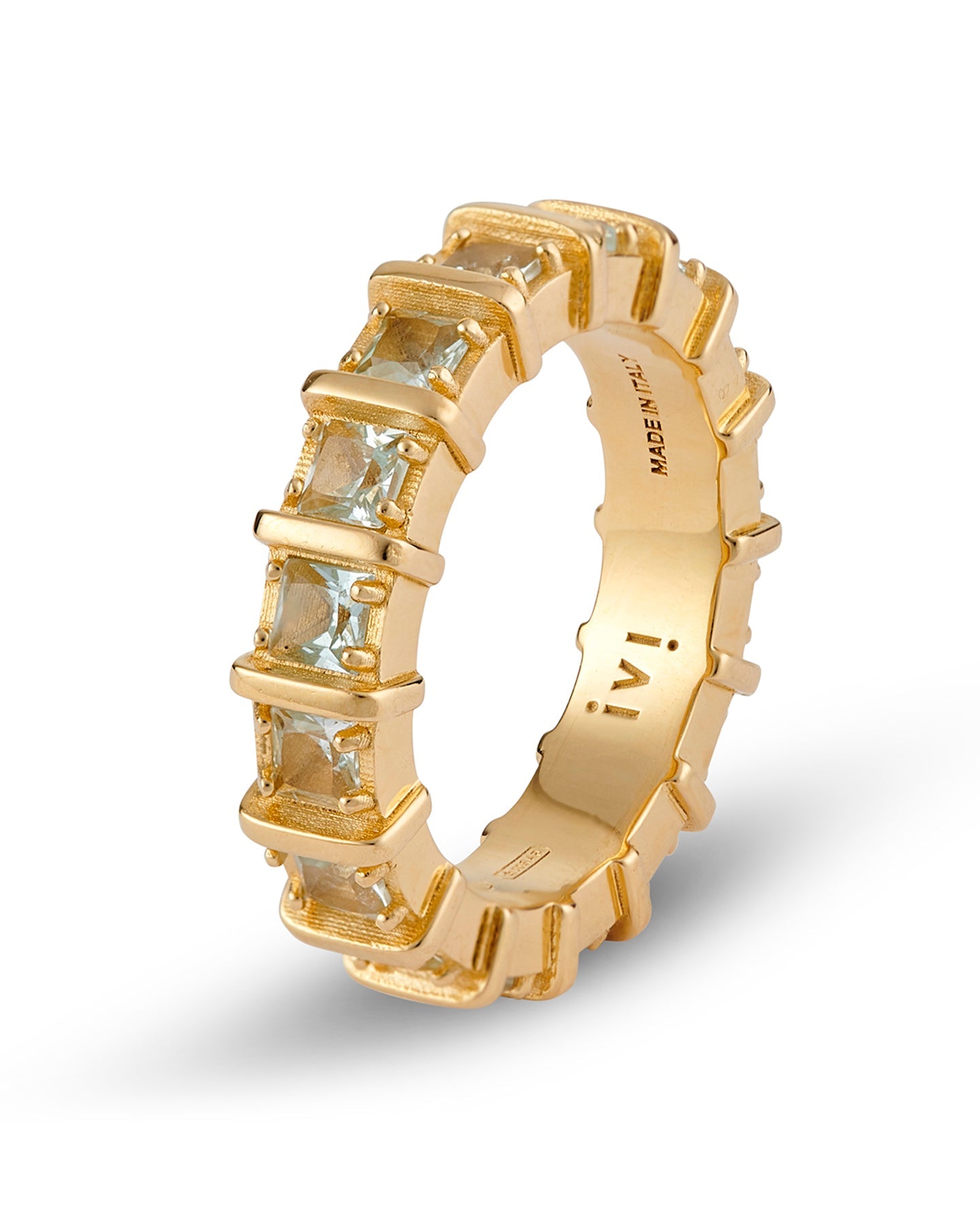 A gold-plated band ring with blue apatite stones set in raised, squared frames.