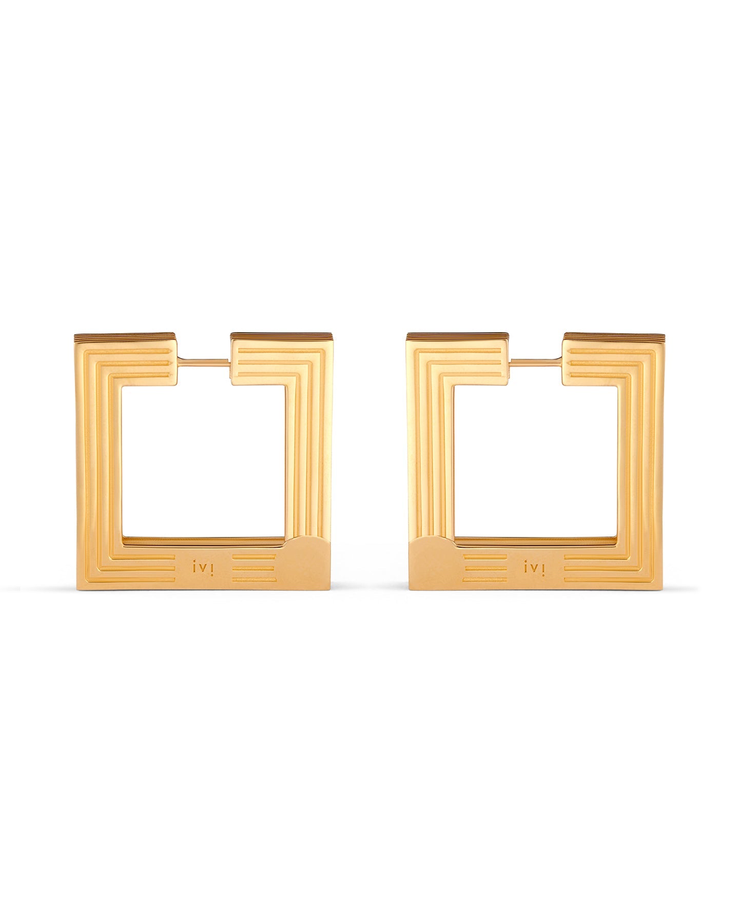 Large gold-plated sculptural hoop earrings on a white background.