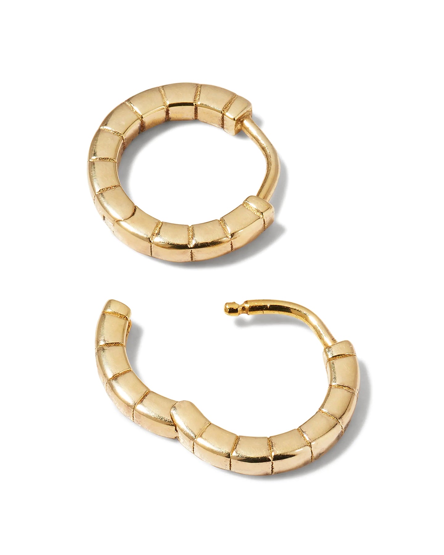 A pair of mini gold-plated Signore hoop earrings with a textured design, resembling a curving row of square beads.