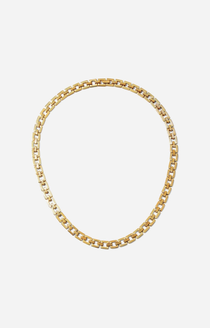 A gold-plated chain choker with interlocking square links.