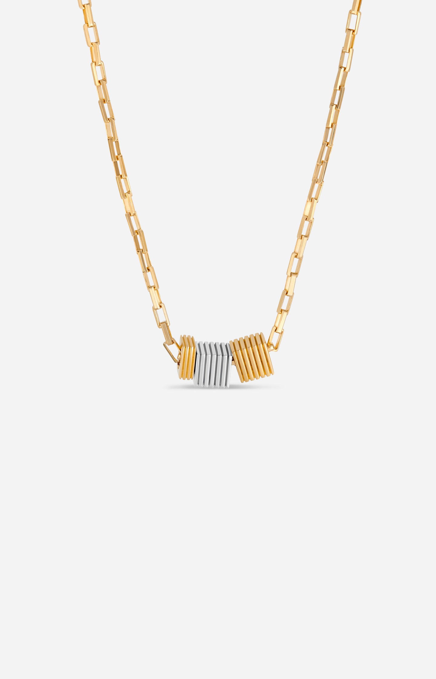 Gold and silver necklace on a white background