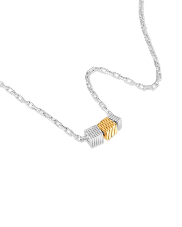 Necklace with a unique pendant design on a white background