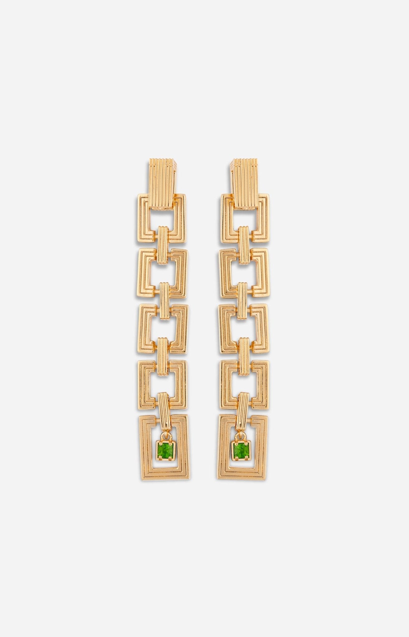 Long gold geometric link earrings with square drop design and green gemstone detail.