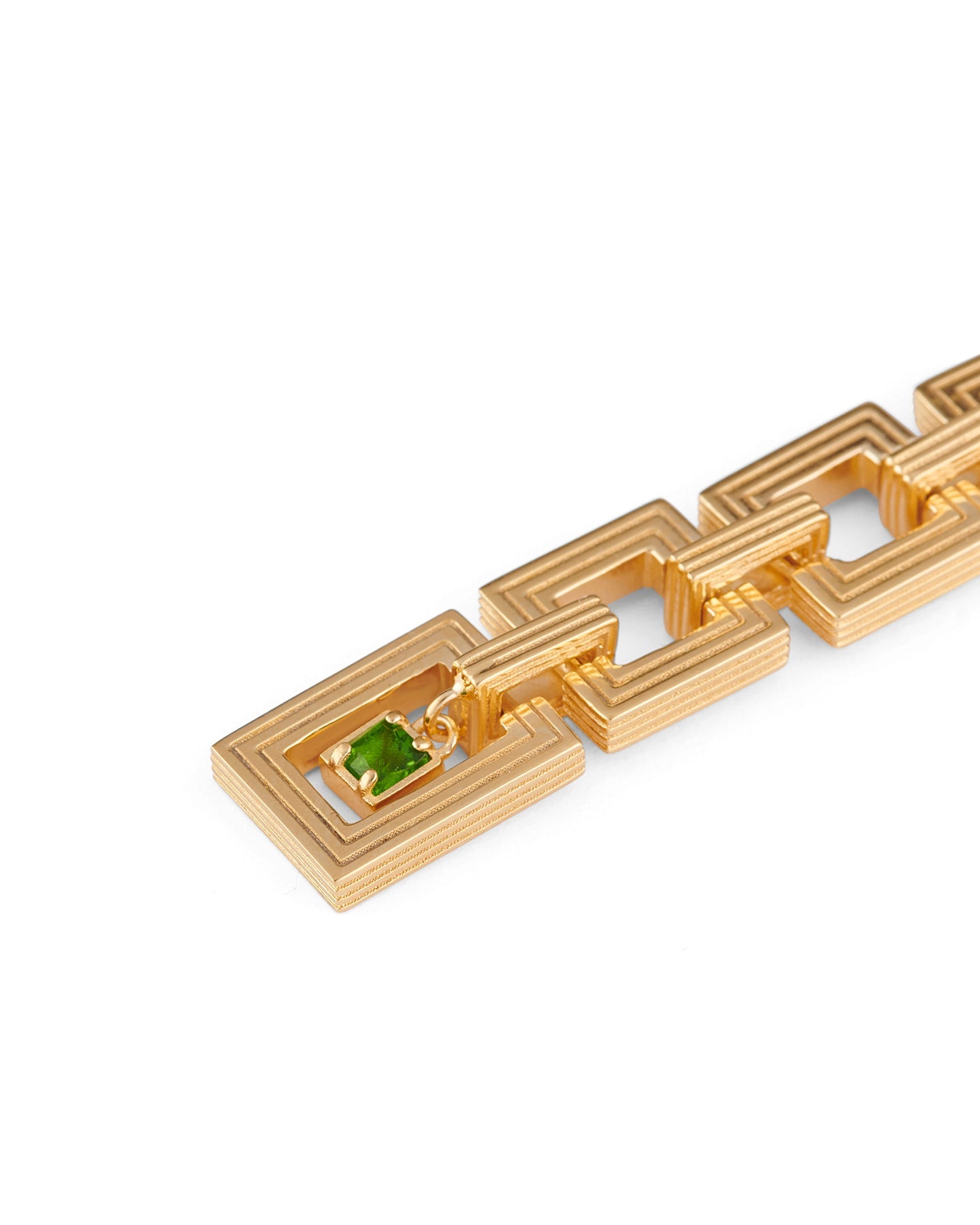 Long gold geometric link earrings with square drop design and green gemstone detail.