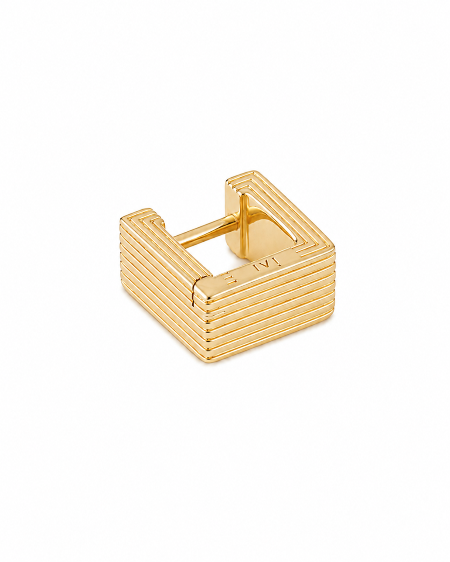 Gold ring with a textured design on a white background