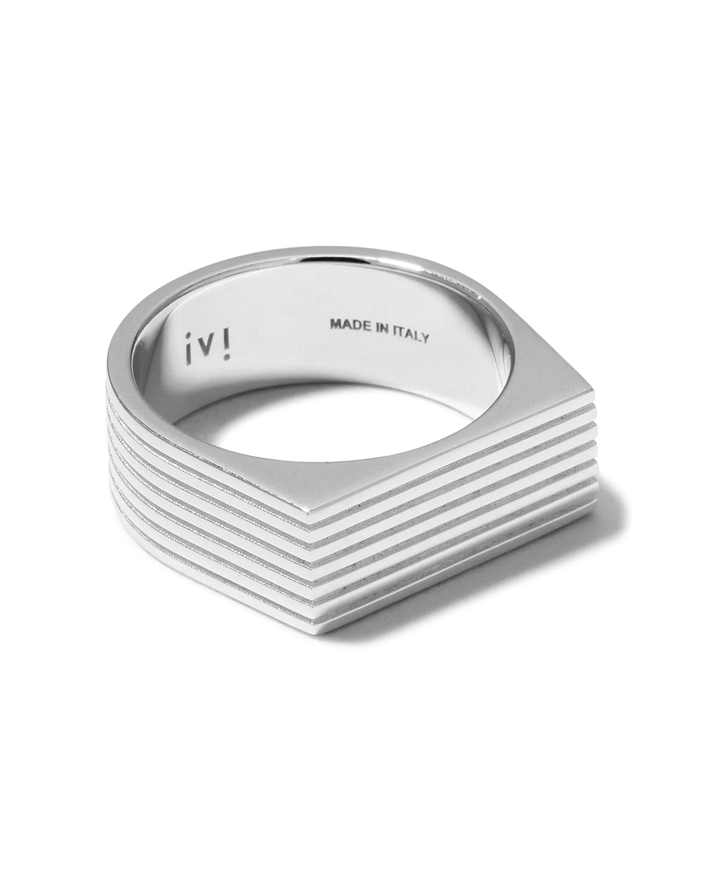 A rhodium-plated silver signet ring with angular proportions