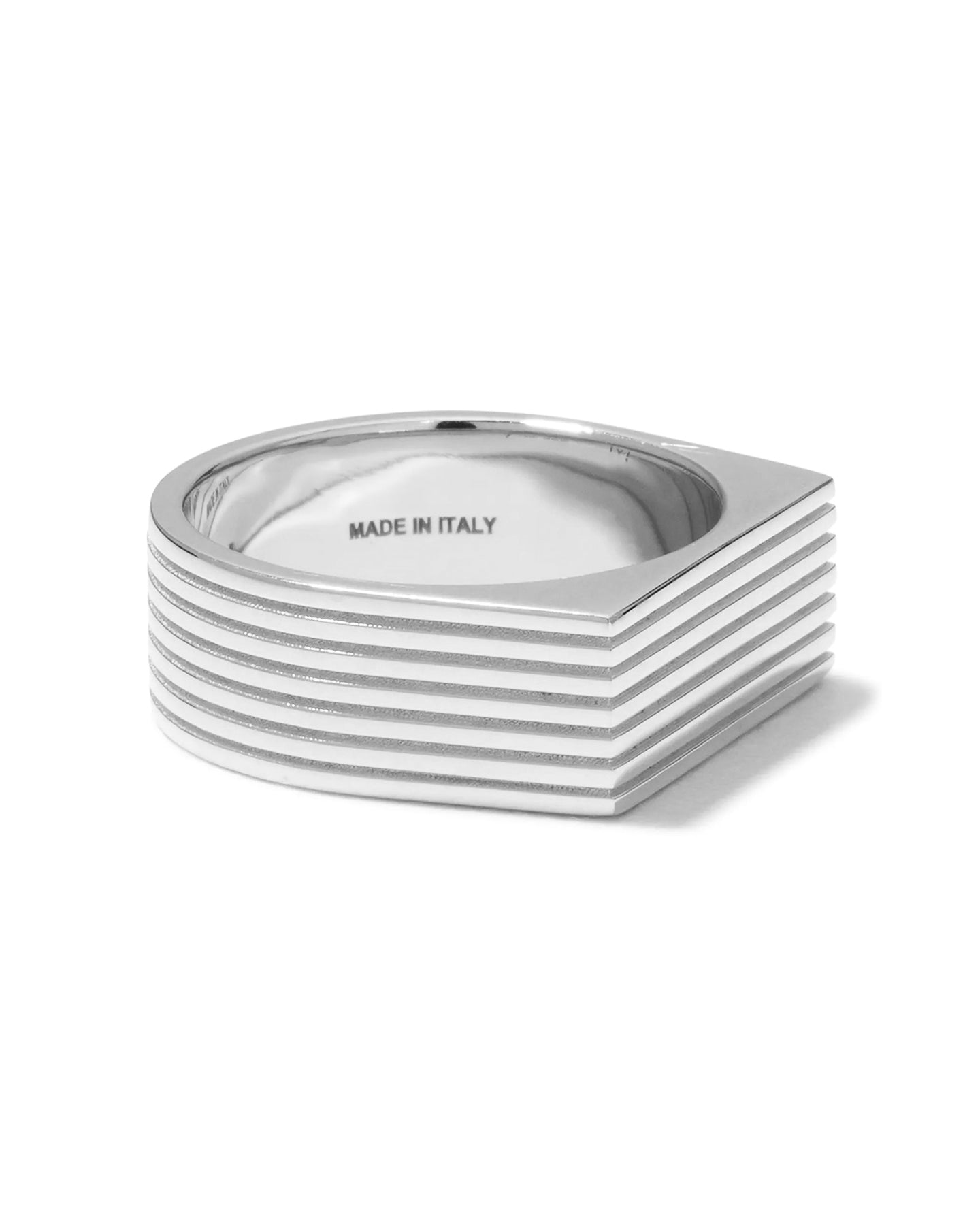 A rhodium-plated silver signet ring with angular proportions