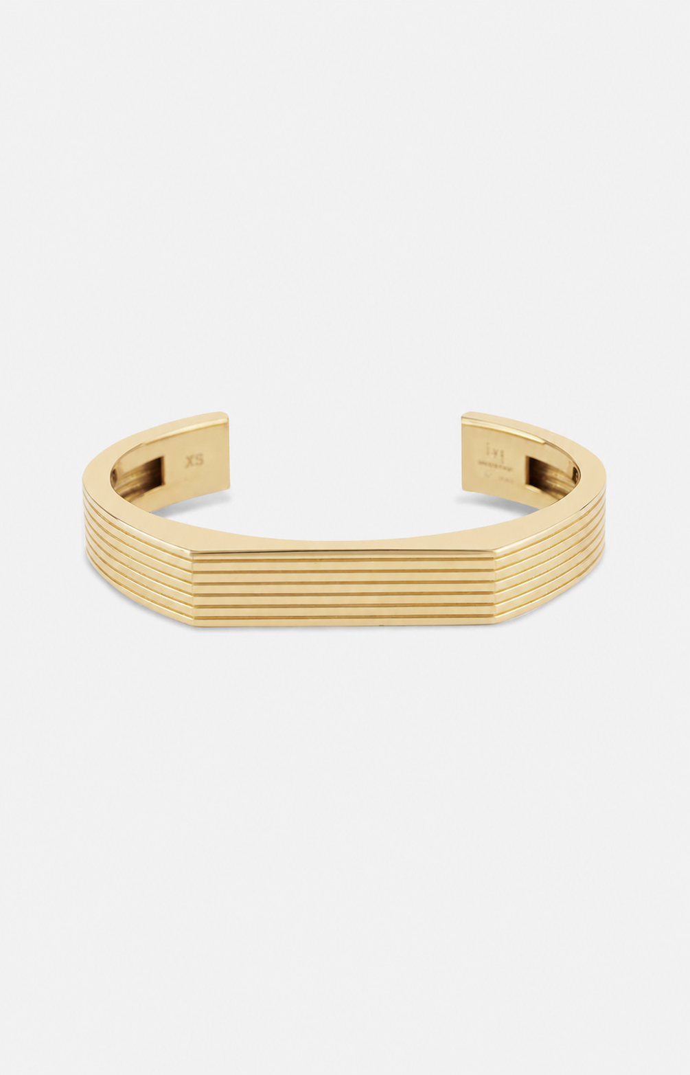 Gold bracelet on a white background