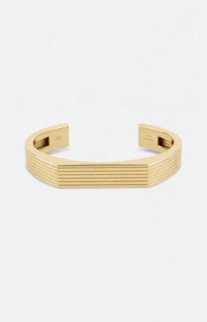 Gold bracelet on a white background