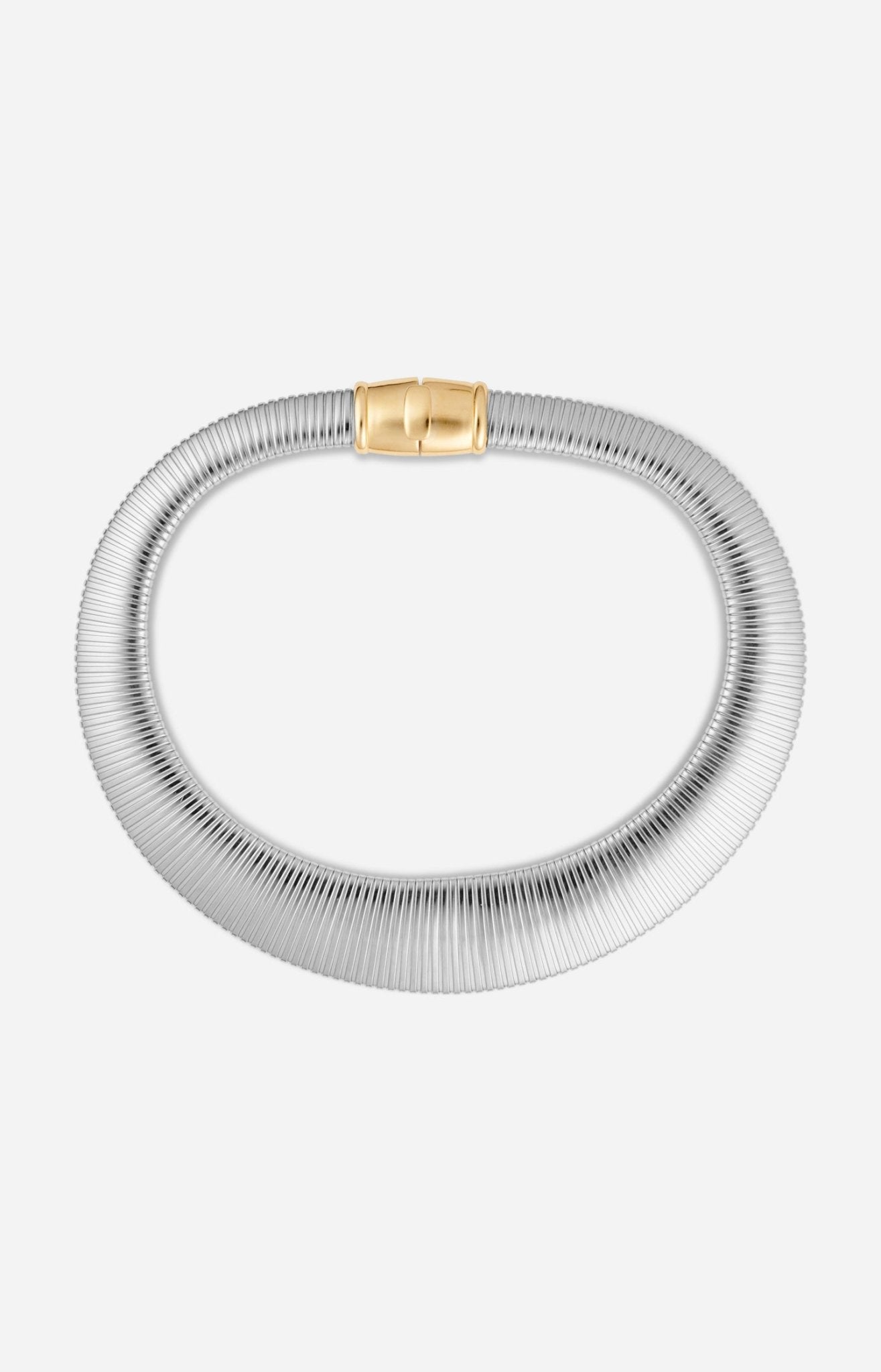 A silver-colored necklace with a chunky, flexible design and a gold-plated clasp. 