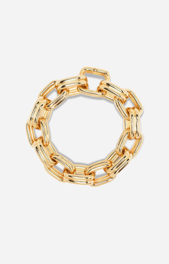 A gold-plated bracelet with oversized oval links, giving it a bold, chunky appearance.