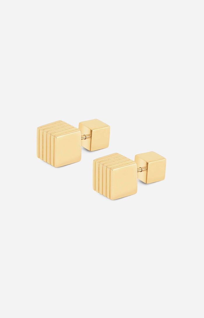 A pair of gold-plated cube-shaped stud earrings with a square post.