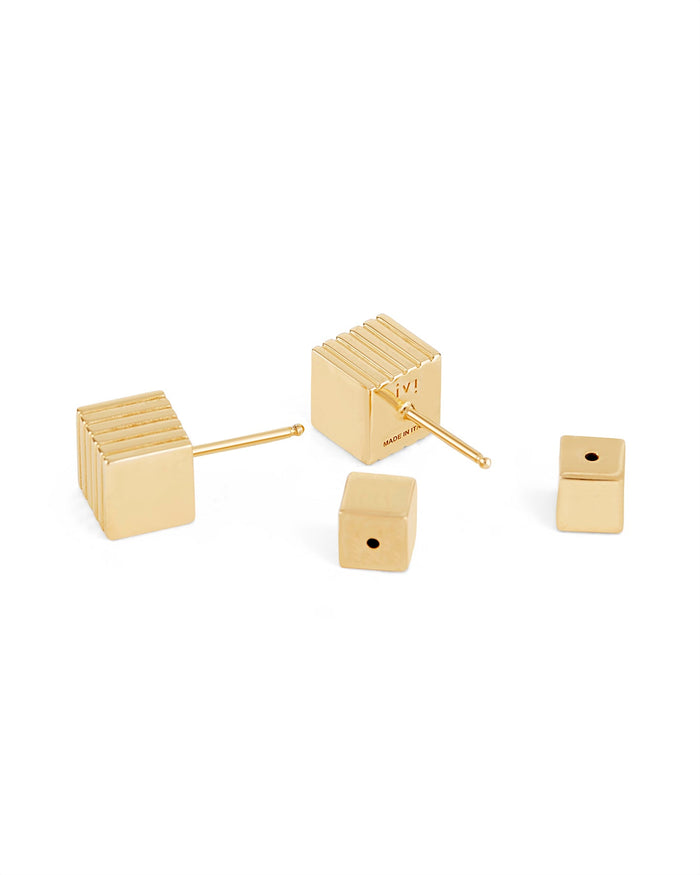 A pair of gold-plated cube-shaped stud earrings with a square post.
