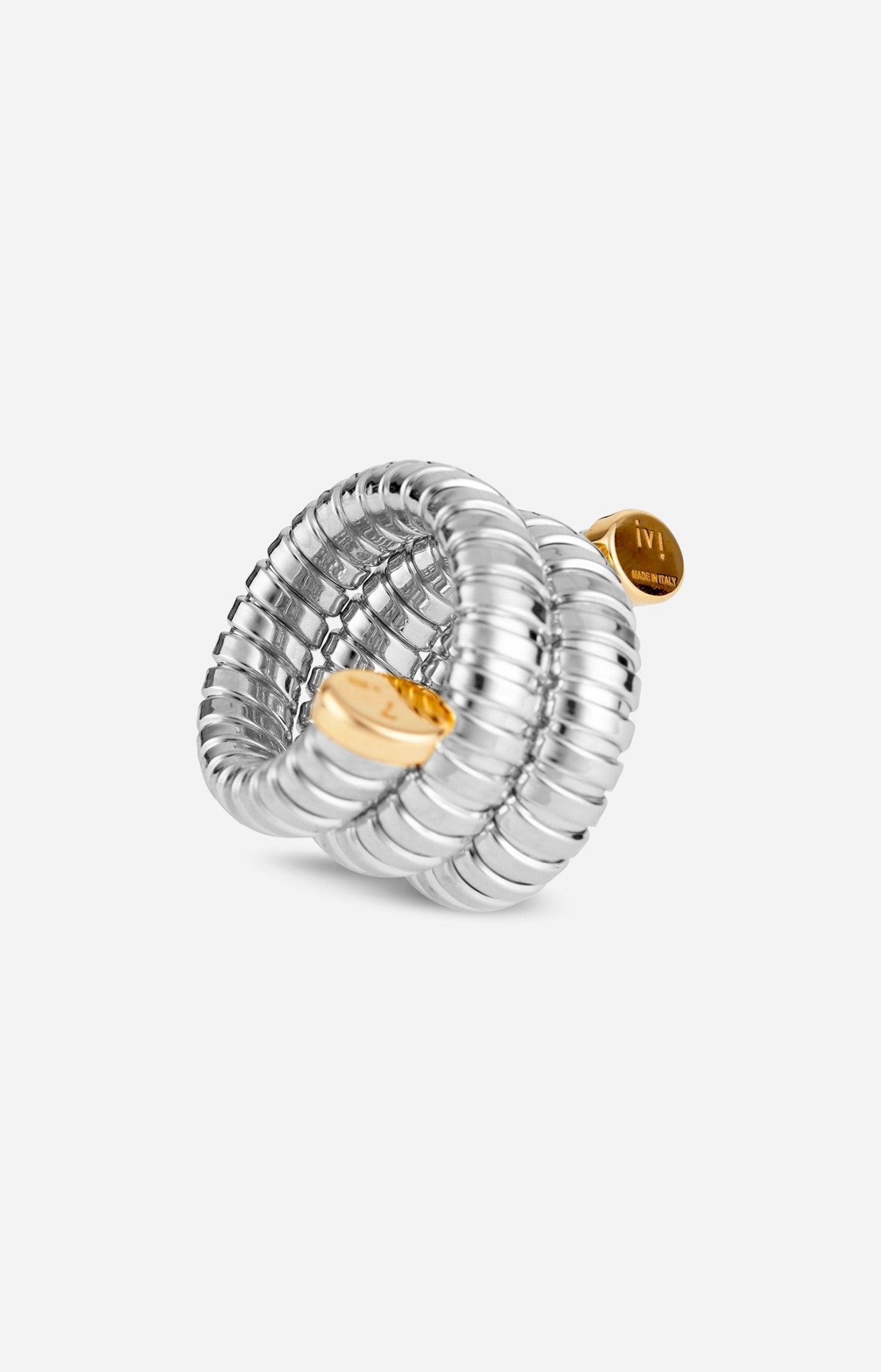 A rhodium-plated silver Gaia Triple Twist ring with gold tips, designed to wrap around the finger in a coiled fashion.
