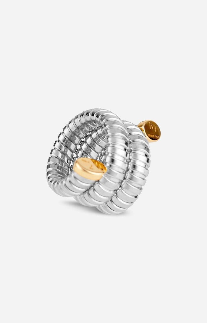 A rhodium-plated silver Gaia Triple Twist ring with gold tips, designed to wrap around the finger in a coiled fashion.