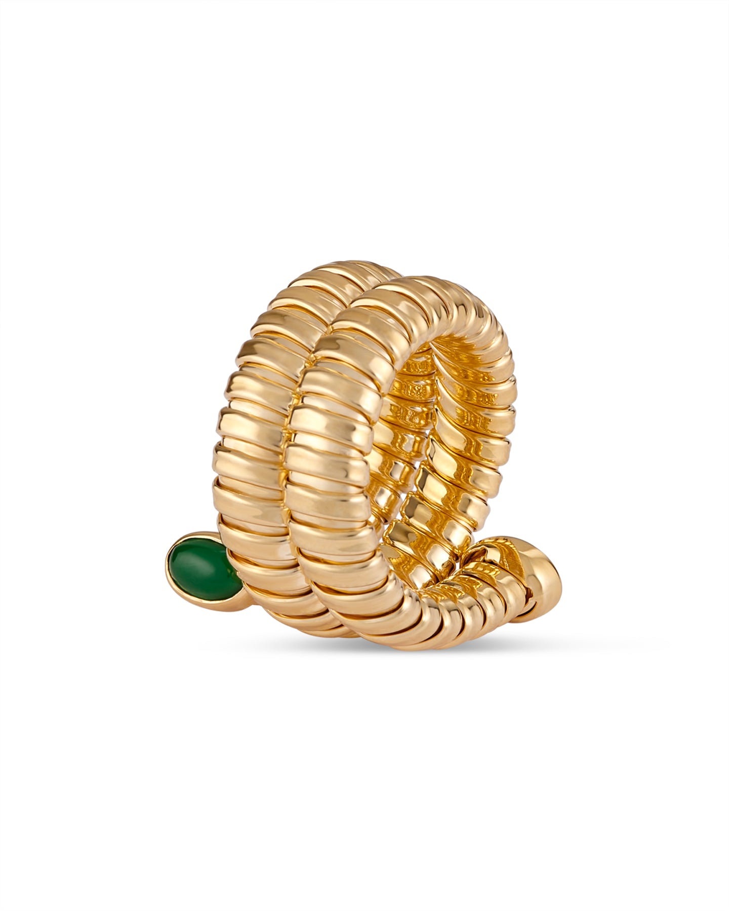 Gold spiral ring with green stones on a white background