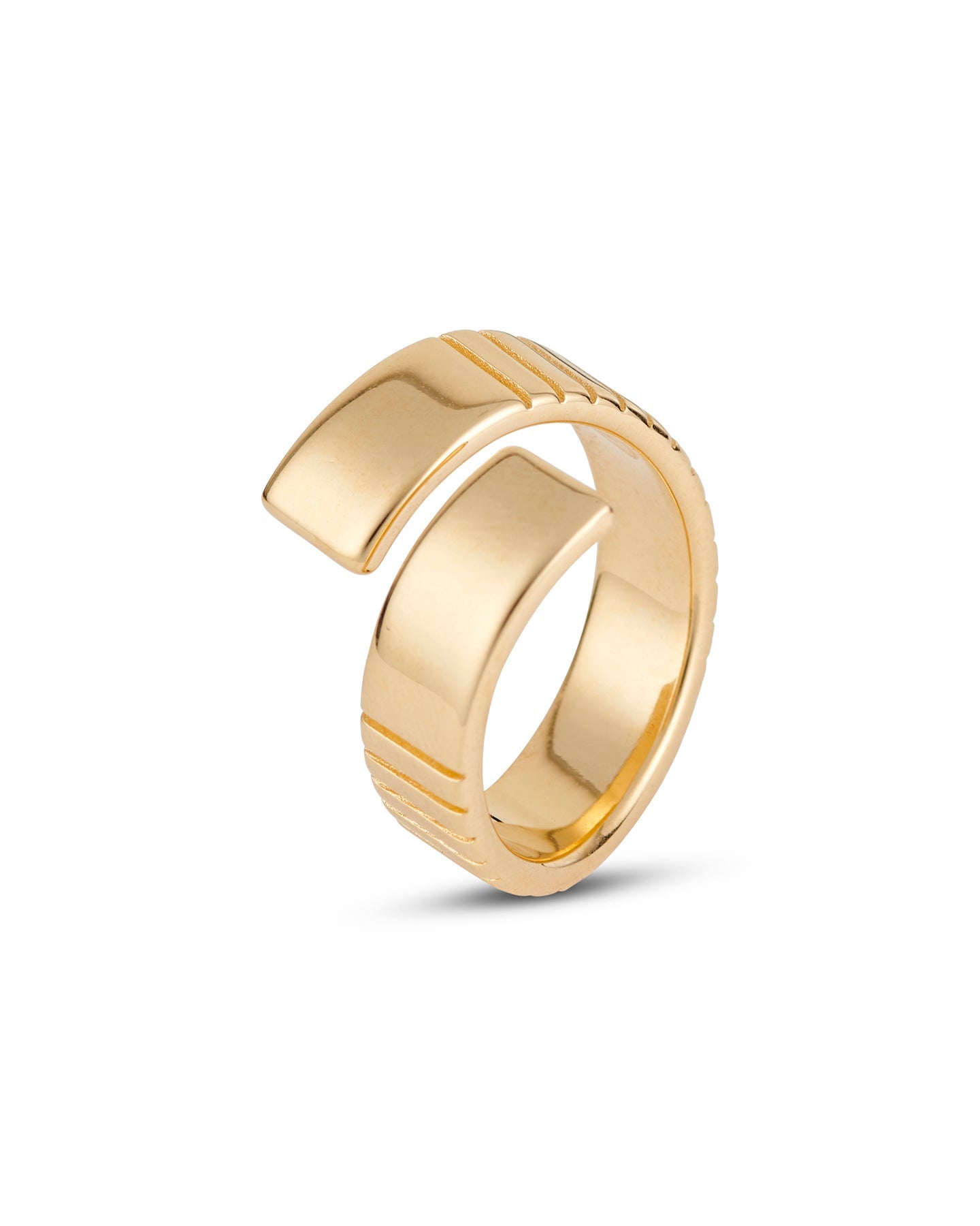 A gold-plated, twist-style ring with a bold aesthetic and meticulous engravings.