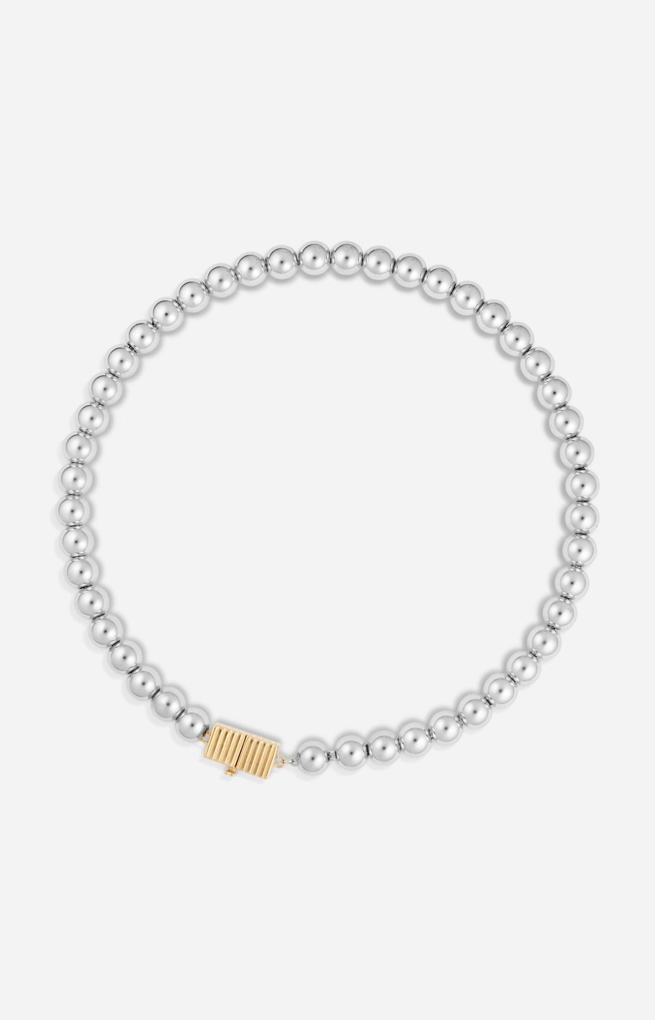 A silver necklace featuring a series of round rhodium-plated beads and a rectangular clasp with a small gold-tone detail.
