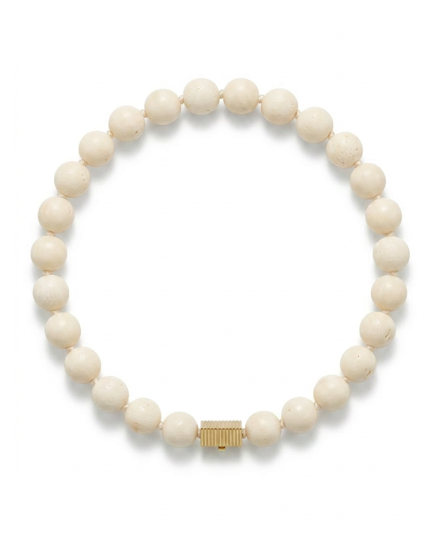 White beaded bracelet with a gold clasp on a white background