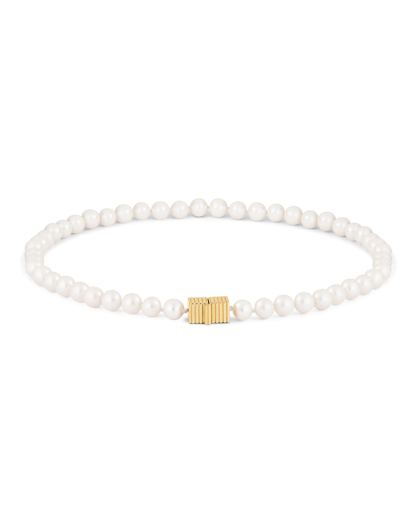 Pearl necklace with a gold clasp on a white background. 
