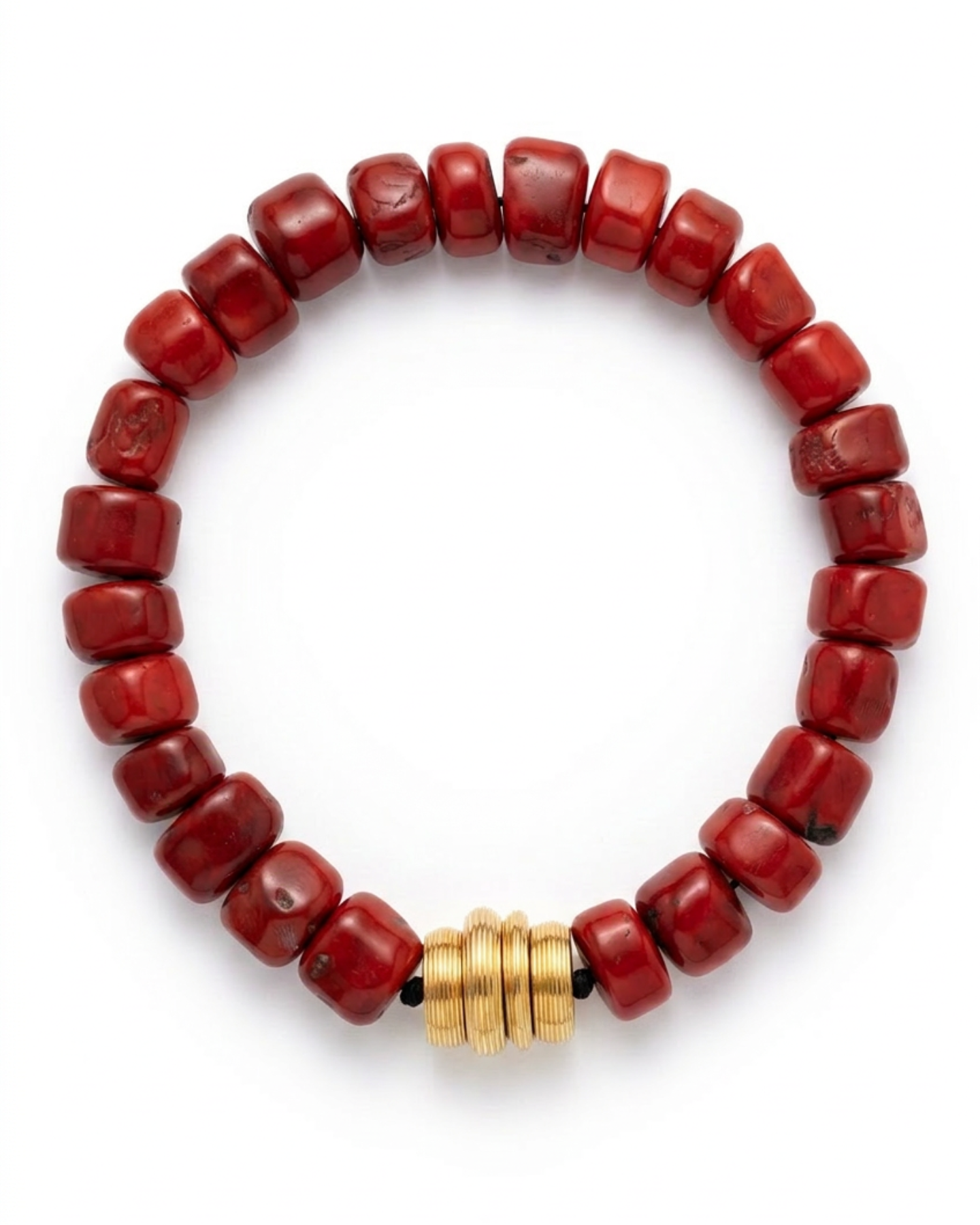 Red coral beaded bracelet with a gold clasp on a white background