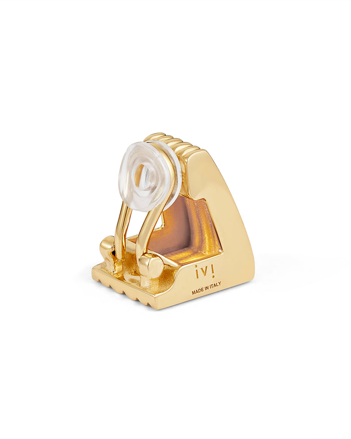 A pair of gold-plated clip earrings with a hollow, squared silhouette and vertical engravings.