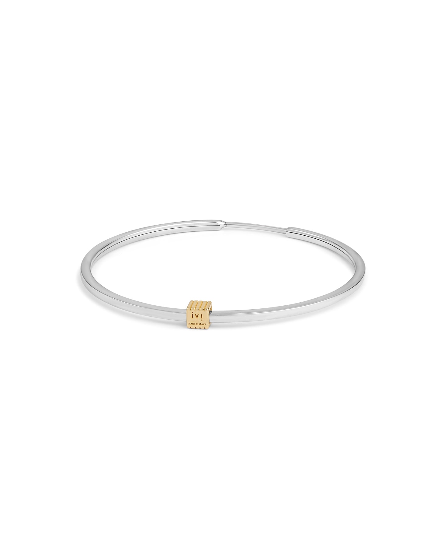 A pair of rhodium-plated medium-sized hoop earrings with a single engraved cube detail on one side.