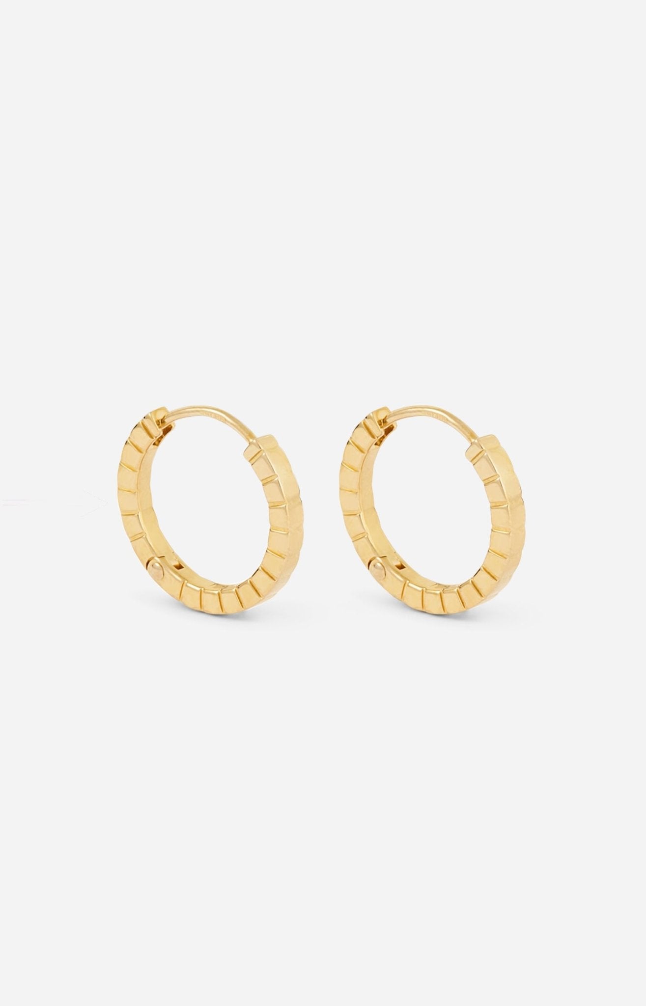 A pair of medium gold-plated Signore hoop earrings with a textured design, resembling a curving row of square beads.