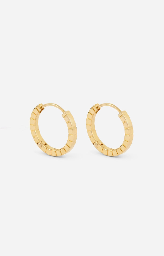 A pair of medium gold-plated Signore hoop earrings with a textured design, resembling a curving row of square beads.