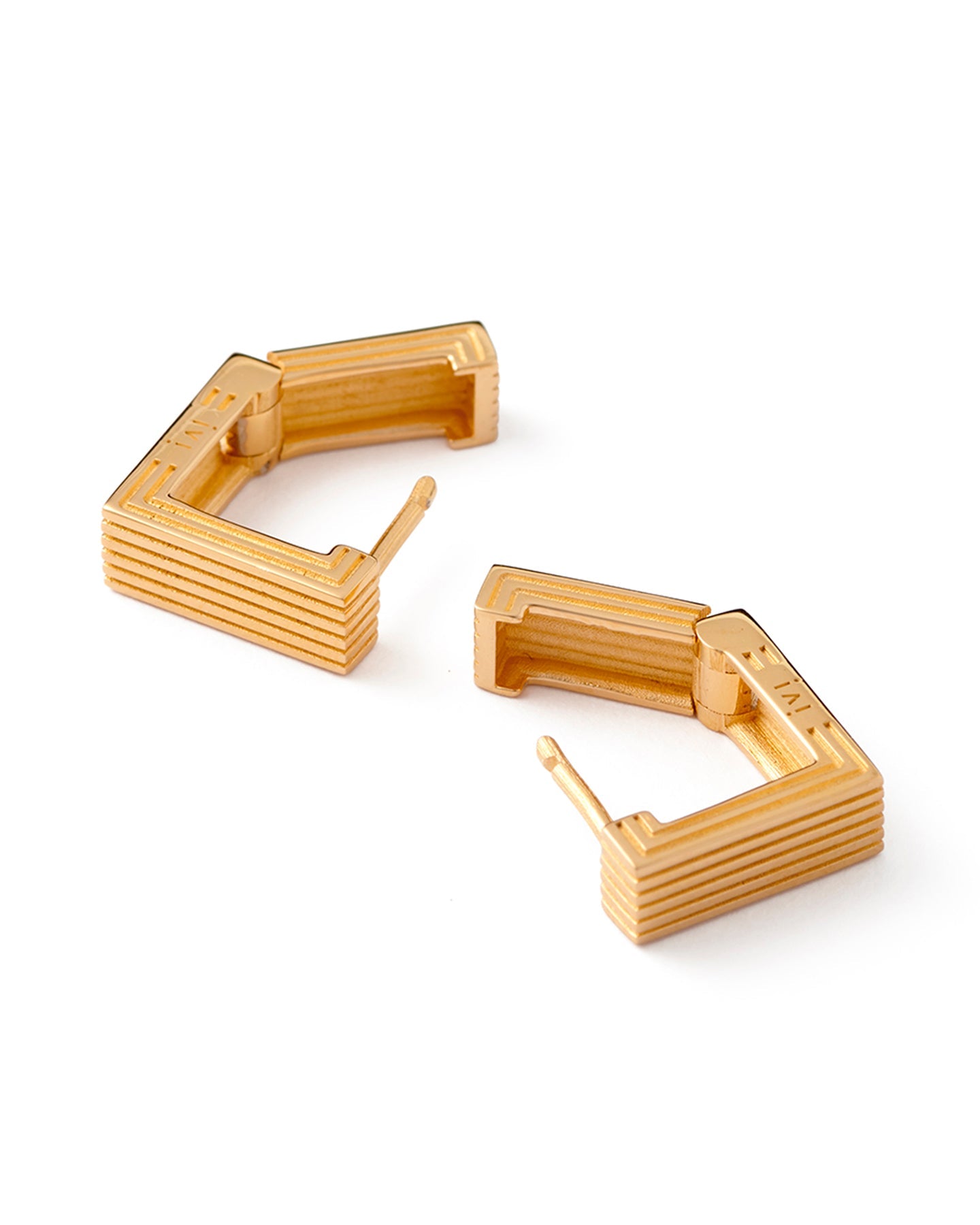 Pair of gold-plated Mini Aurelia sculptural square hoop earrings on a white background.