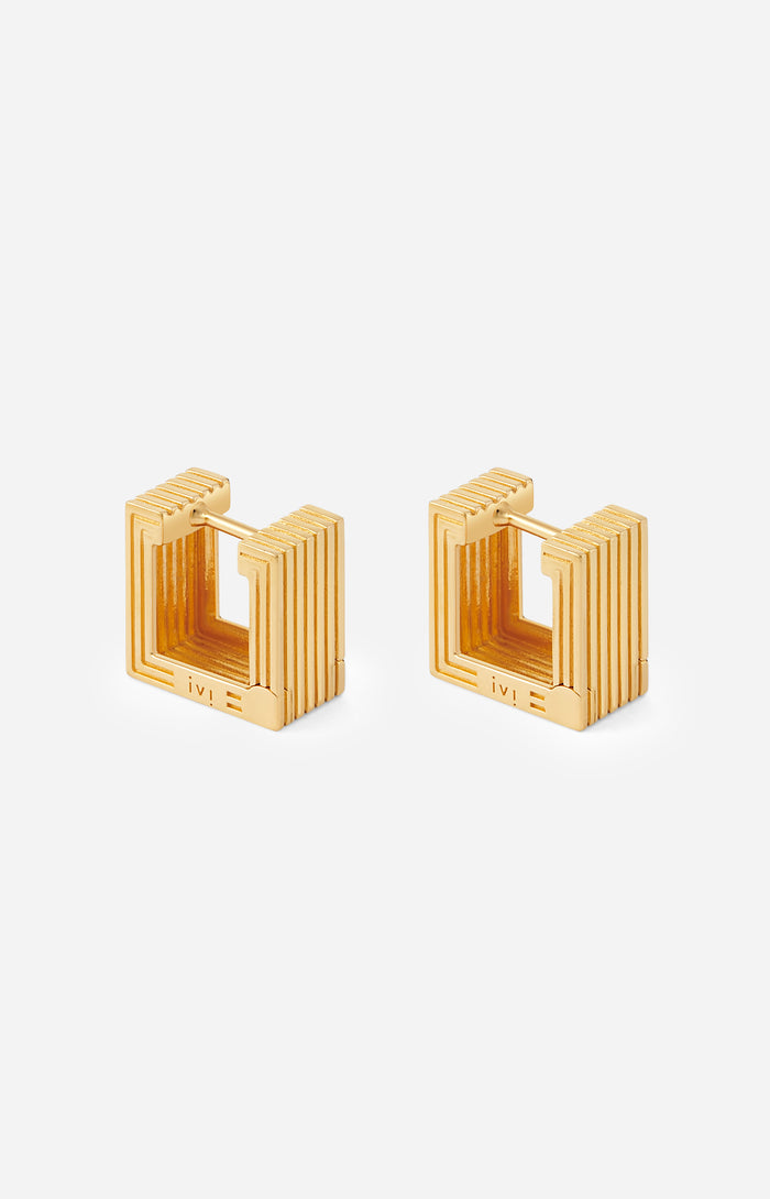 Pair of gold-plated Mini Wide Aurelia sculptural square hoop earrings on a white background.