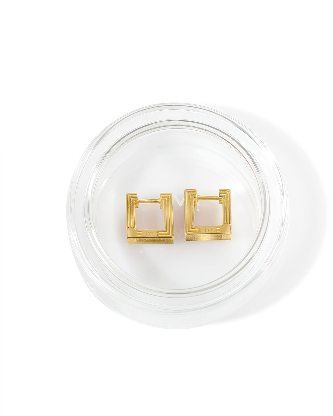 Pair of gold-plated Mini Wide Aurelia sculptural square hoop earrings in glass packaging