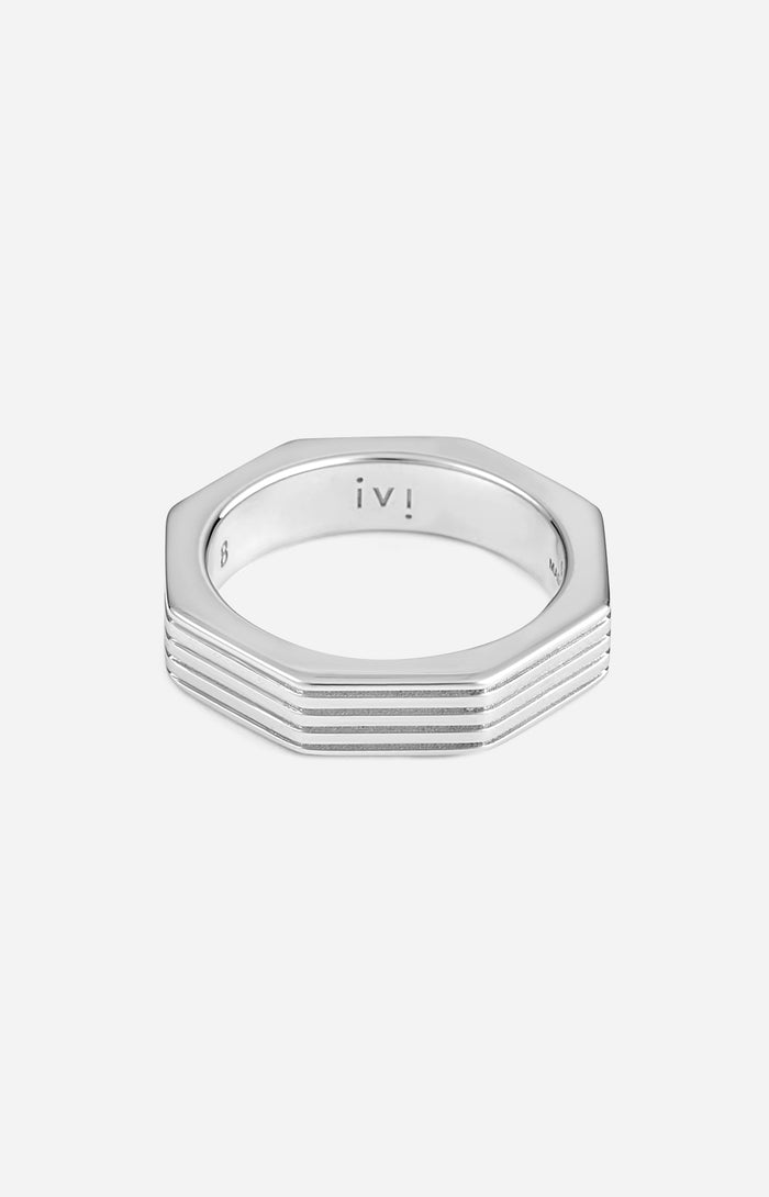 Hexagonal rhodium-plated ring on a white background