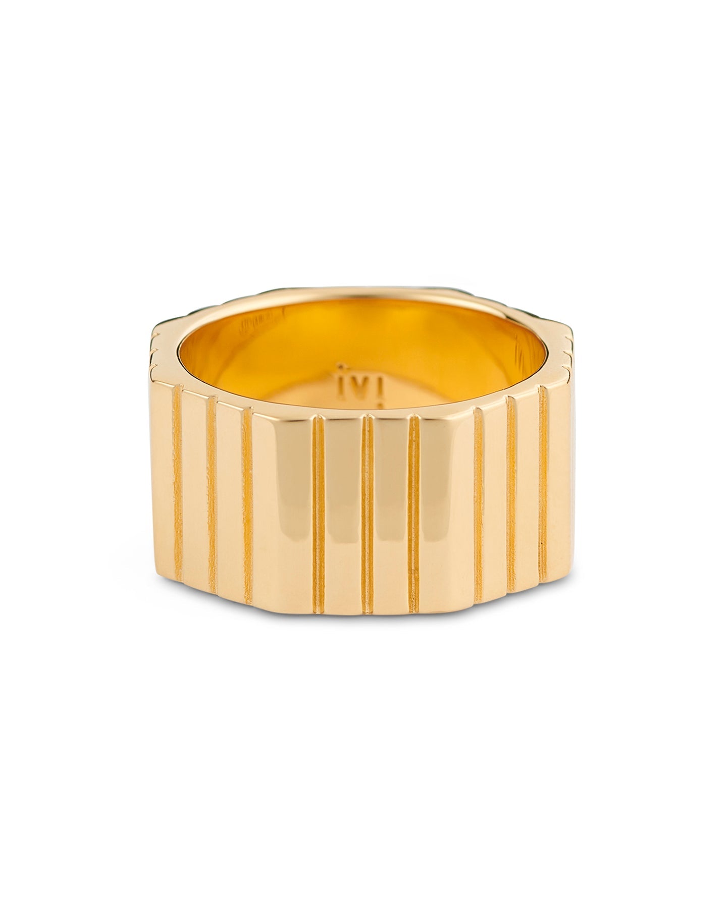 A gold-plated, octagonal-shaped ring with linear engravings on the band