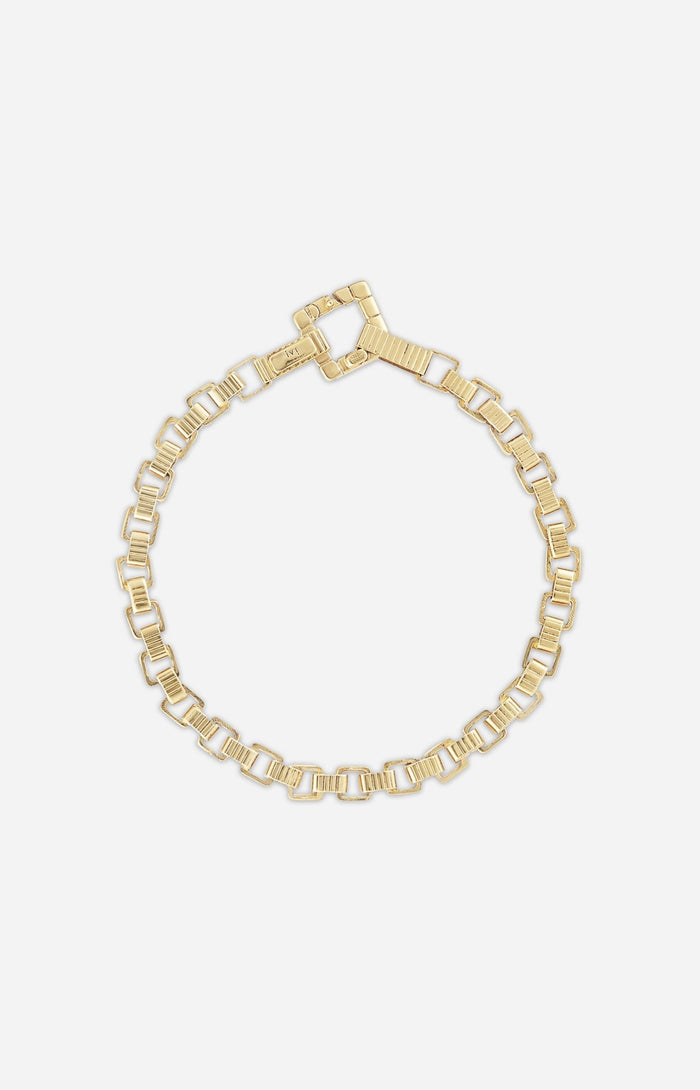 A gold-plated chain bracelet with angular links and a square clasp, displayed against a white background.