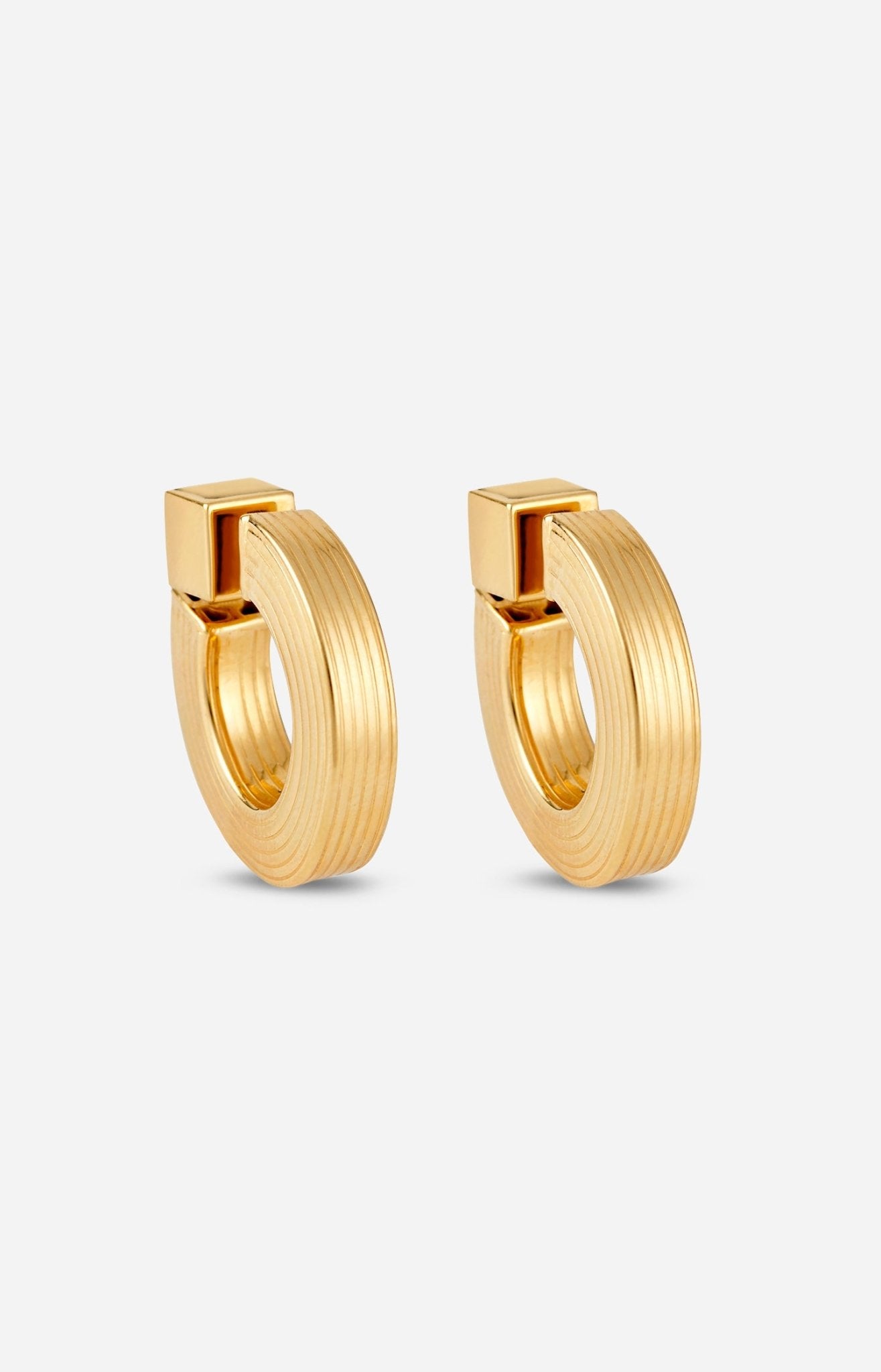 A pair of gold-plated hollow hoop earrings with a square post.