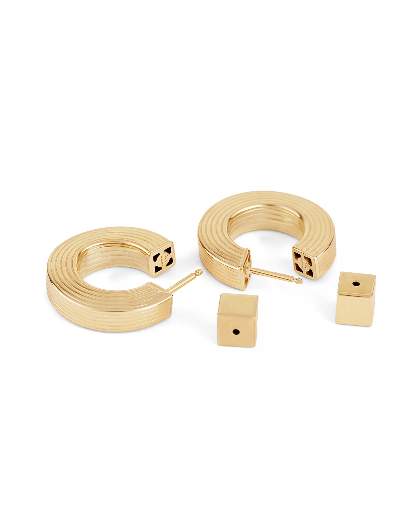 A pair of gold-plated hollow hoop earrings with a square post.