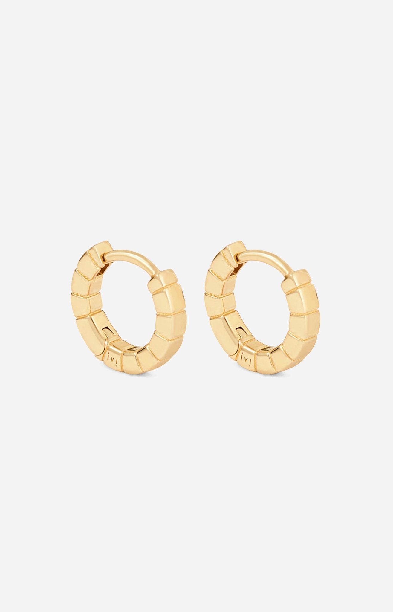 A pair of mini gold-plated Signore huggies with a textured design, resembling a curving row of square beads.