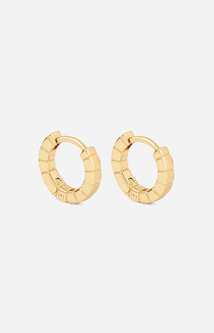 A pair of mini gold-plated Signore huggies with a textured design, resembling a curving row of square beads.