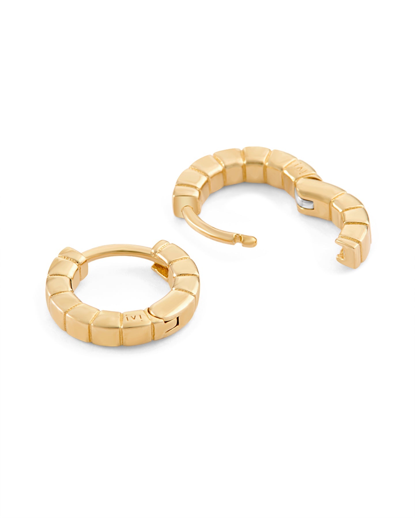 A pair of mini gold-plated Signore huggies with a textured design, resembling a curving row of square beads.