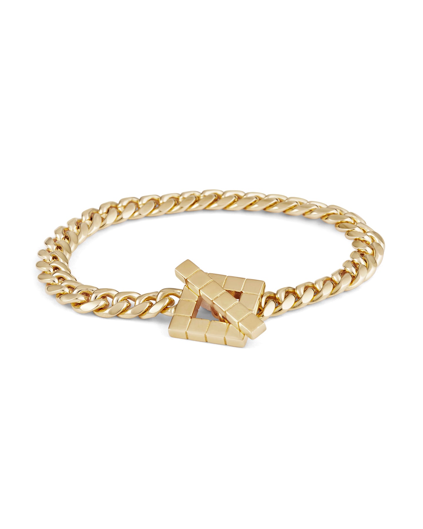A gold-plated chunky chain necklace with a sculptural geometric clasp on a white background.