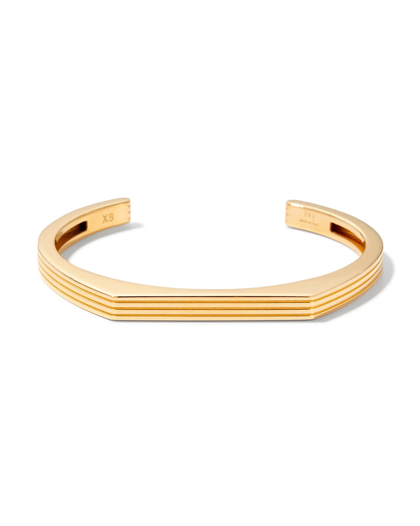 A gold-plated cuff bracelet with a sleek, modern design displayed on a white background