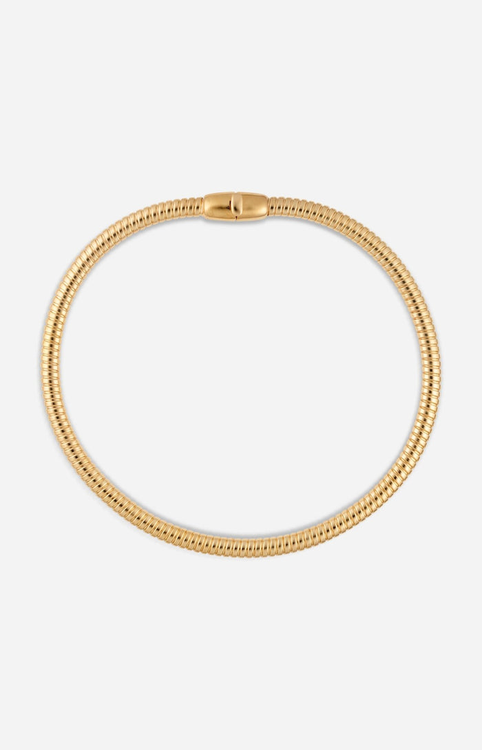Gold-plated tubogas necklace with a flexible ribbed design and concealed clasp on a white background.