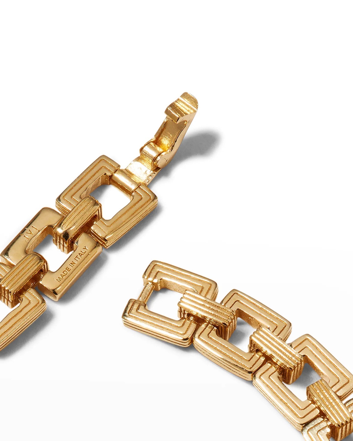A gold-plated chain choker with interlocking square links.