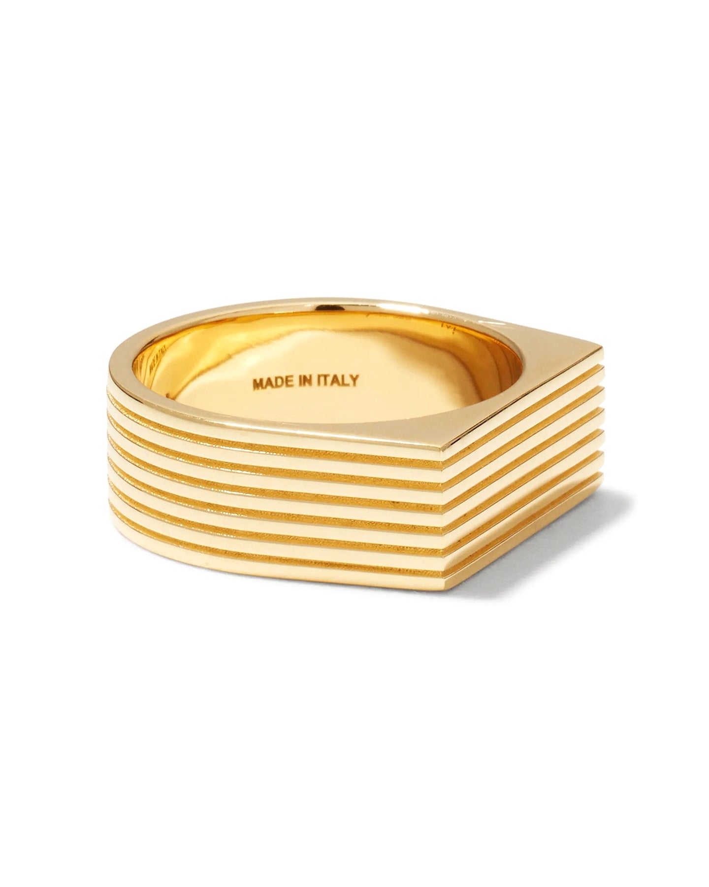A gold-plated signet ring with angular proportions